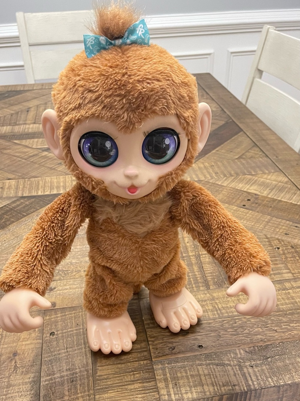 the furReal Peanut the Playful Monkey Interactive Toy, an animatronic plush